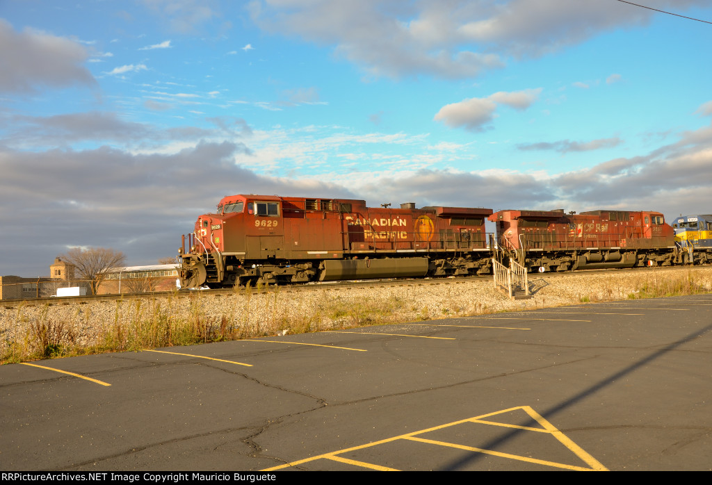 CP AC44CW Locomotives leading a train